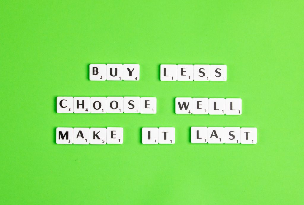 letter tiles spell "buy less, choose well, make it last"